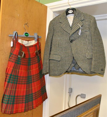 Lot 344 - Child's kilt outfit with Clan Cameron tartan kilt and tie, three berets, pair of socks, two leather