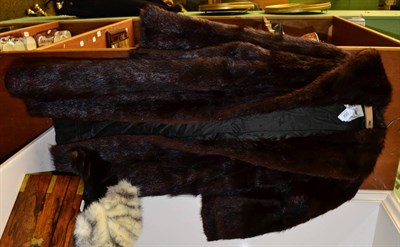 Lot 354 - A full length fur coat ";Pettigrews of Glasgow";, a mink fur hat and another in white (3)