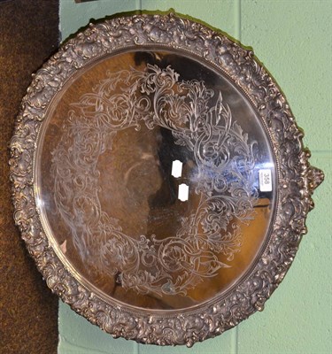 Lot 358 - A large plated engraved salver with ornate border