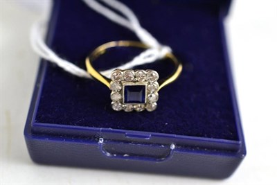 Lot 369 - A sapphire and diamond cluster ring, stamped '18CT' and 'PLAT', total estimated diamond weight 0.35