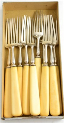 Lot 383 - A set of ten George III table forks with ivory handles and silver tines, maker's mark MB,...