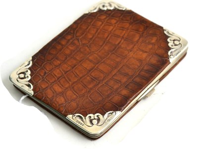 Lot 397 - A silver mounted crocodile skin wallet/pouch