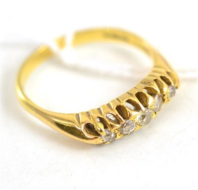 Lot 400 - An 18ct gold diamond five stone ring, total diamond weight 0.35ct approximately