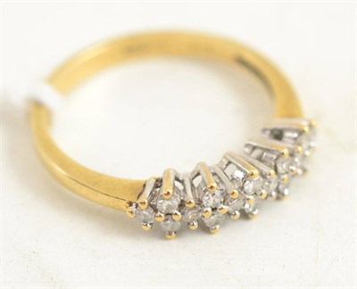 Lot 401 - A 9ct gold diamond dress ring