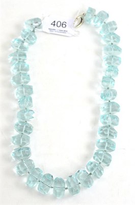 Lot 406 - A clear blue coloured bead necklace