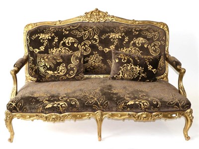 Lot 973 - A 19th Century Giltwood and Gesso Two-Seater Sofa, in Louis XV style, recovered in brown and...