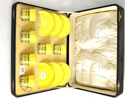 Lot 428 - A cased Shelley coffee set, yellow ground with silver holders