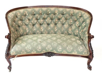 Lot 977 - A Victorian Rosewood Framed Tub Shaped Two-Seater Sofa, mid 19th century, recovered in green floral