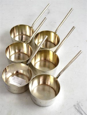 Lot 475 - A set of six George VI miniature silver sauce pans, Lee & Wigfull, Sheffield 192, circular with...