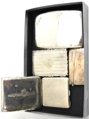 Lot 501 - A collection of silver comprising: a card case; a compact; a small card case; a cigarette case;...