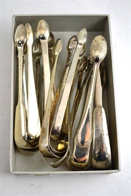 Lot 507 - Six pairs of Old English pattern silver sugar tongs, two pairs of Fiddle pattern sugar tongs...