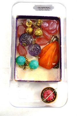 Lot 516 - Carved Chinese amethysts and other Items and an amber pendant