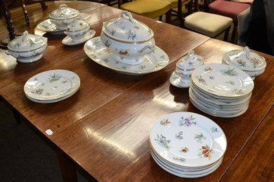 Lot 543 - Decorative Continental part dinner service including tureens and covers, plates etc