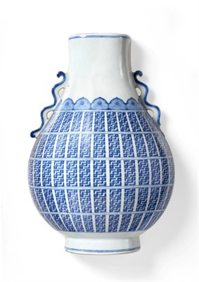 Lot 194A - <strong>A Chinese Porcelain Wall Pocket</strong>, of baluster vase form, painted in underglaze blue