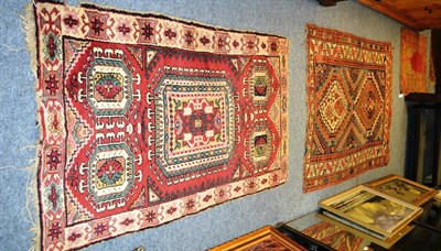 Lot 1005 - Mudjur Prayer rug, central Anatolia, the stepped raspberry field beneath a Mihrab flanked by...