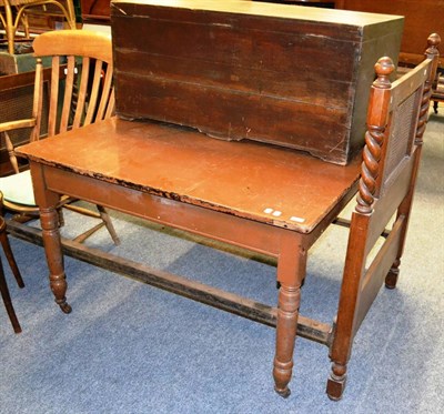 Lot 1026 - A painted pine table and a Waring & Gillows oak single bedstead