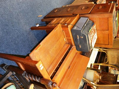 Lot 1028 - A light oak desk ";The Secrytype";, an oak four height filing cabinet, record player and records