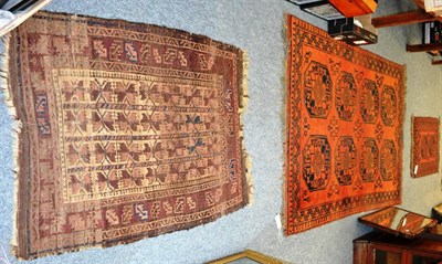 Lot 1032 - Turkmen rug, North West Afghanistan, the rust field with two columns of 'elephant foot' guls...