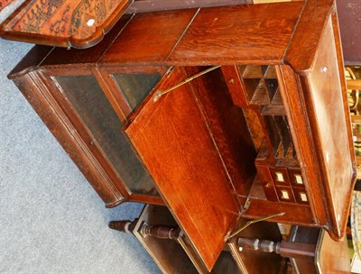 Lot 1039 - An oak bureau with two Globe Wernicke style stacking bookcases below