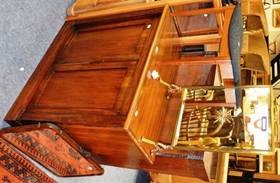 Lot 1040 - A mahogany two door cabinet, a brass framed mirrored firescreen, a modern stool labelled ";Vanson"