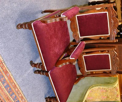 Lot 1047 - Victorian walnut gentleman's armchair and a matching chair