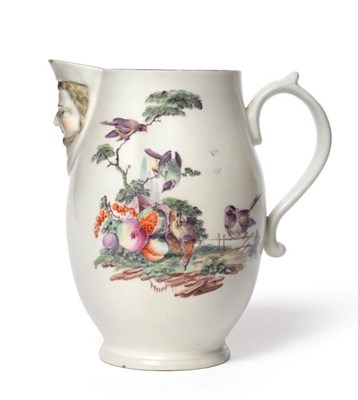 Lot 7 - A Derby Porcelain Mask Jug, circa 1765, of ovoid form, painted with birds in fruiting branches,...