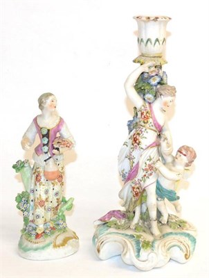 Lot 9 - A Derby Porcelain Figure of a Girl, circa 1770, standing holding a flask, on a scroll moulded base