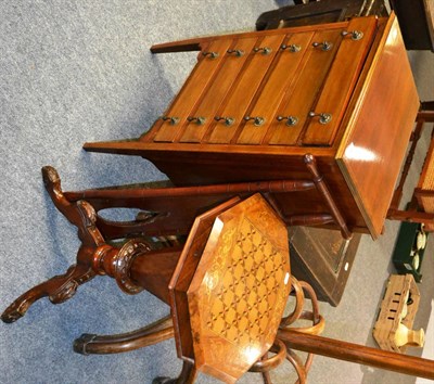 Lot 1067 - A small inlaid music cabinet, a Victorian inlaid sewing table and a hinged mahogany boot pull (3)