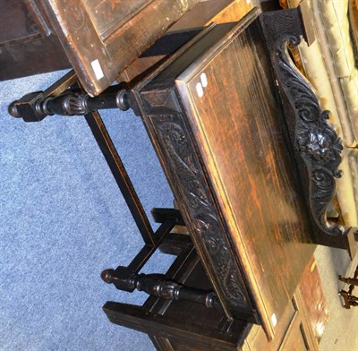 Lot 1070 - A late 19th/early 20th century carved oak hall table with single drawer