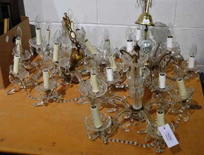 Lot 1075 - Three glass and brass chandeliers with glass drops