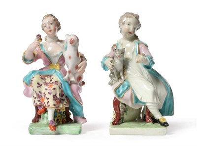 Lot 12 - A Pair of Derby Porcelain Figures, circa 1770, as a seated boy and girl, she with a dog, he...