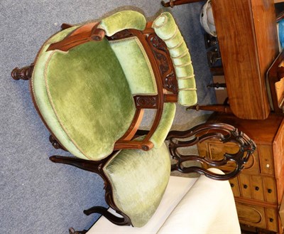 Lot 1128 - A Victorian carved mahogany tub chair and a Victorian salon chair (2)