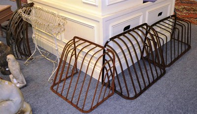 Lot 1145 - Five iron hay racks