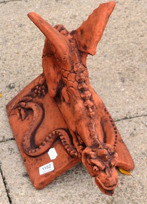 Lot 1152 - Small winged dragon roof ridge tile, 44cm high by 46cm long