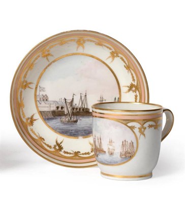 Lot 21 - A New Hall Porcelain Coffee Cup and Saucer, circa 1795, painted with views of Chatham Docks, within
