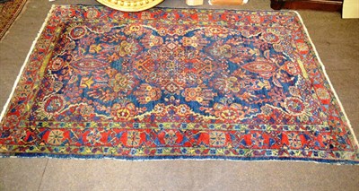 Lot 1200 - Kashgai rug, South West Persia, the indigo field with three stepped medallions enclosed by multiple