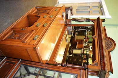 Lot 1208 - A late Victorian carved oak mirror back sideboard