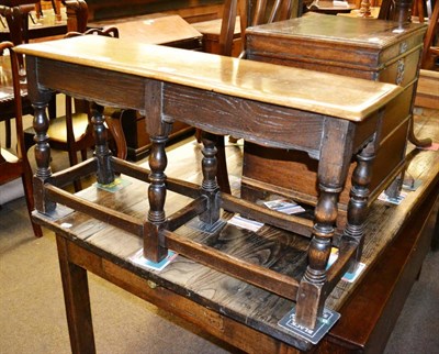 Lot 1219 - An oak double stool