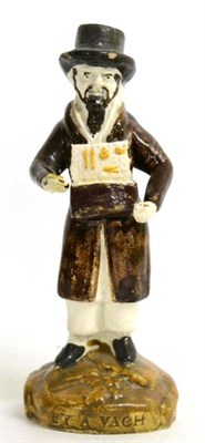 Lot 27 - A Prattware Figure of a Jewish Pedlar, circa 1800, the bearded figure standing holding an open...