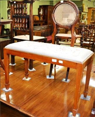 Lot 1239 - Mahogany duet stool with woolwork top and a child's high chair with caned seat and back