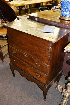 Lot 1258 - An eighteenth century oak chest on stand