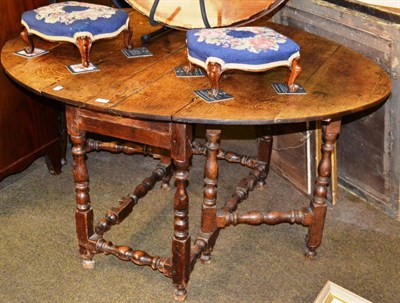 Lot 1259 - A 19th century oak gateleg table