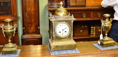 Lot 1267 - Brass clock garniture