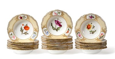Lot 31 - A Set of Twenty-Four Coalport Porcelain Soup Plates, circa 1815, painted with flower sprigs...
