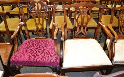 Lot 1277 - A 19th century mahogany carver chair and a similar one, both with carved splats