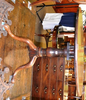 Lot 1303 - A George III mahogany snap top supper table