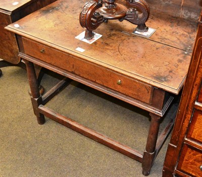 Lot 1307 - An 18th century oak side table