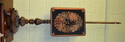 Lot 1338 - A 19th century rosewood pole screen with needlework panel