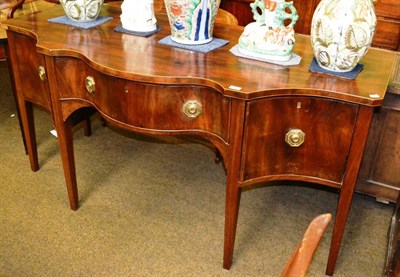 Lot 1350 - George III mahogany serpentine fronted sideboard