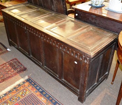 Lot 1355 - An 18th century panelled oak coffer